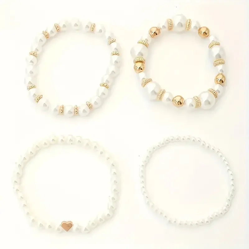 Set de pulseras de perlas con detalles dorados