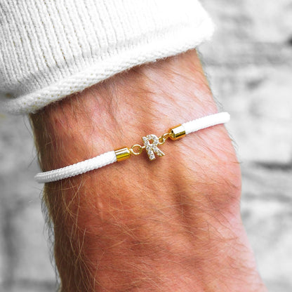 Pulseras ajustables con inicial