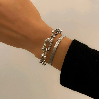 Set de 2 pulseras llamativas: cadena con cierre y espiga