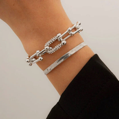 Set de 2 pulseras llamativas: cadena con cierre y espiga