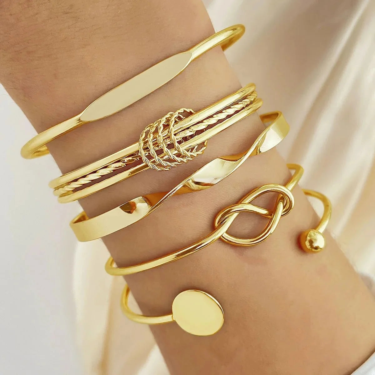Set de 5 brazaletes trenzados apilables
