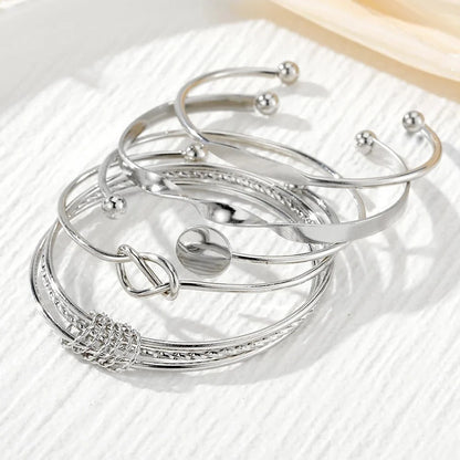 Set de 5 brazaletes trenzados apilables