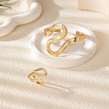 Set ajustable de pulsera y anillo de espiral moderna