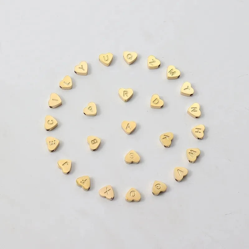 Pulseras ajustables con corazón e inicial