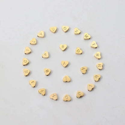 Pulseras ajustables con corazón e inicial