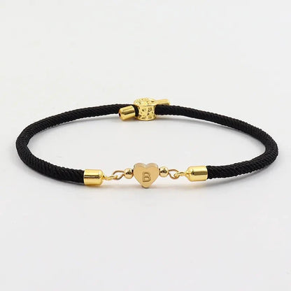 Pulseras ajustables con corazón e inicial