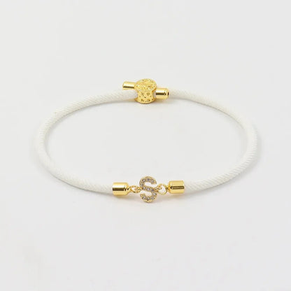 Pulseras ajustables con inicial