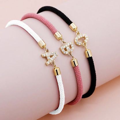 Pulseras ajustables con inicial