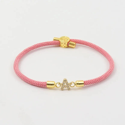 Pulseras ajustables con inicial
