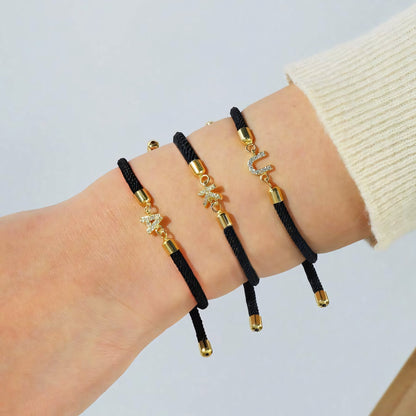 Pulseras ajustables con inicial