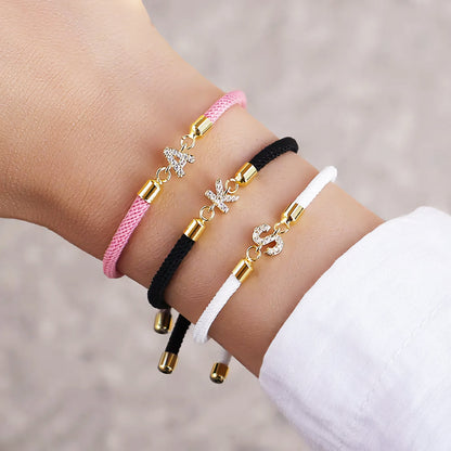 Pulseras ajustables con inicial