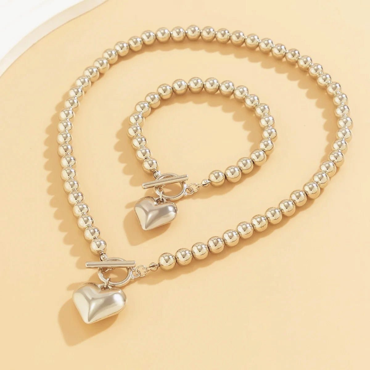 Set de 2 piezas de cuentas con corazón: pulsera y collar