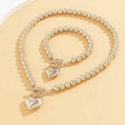 Set de 2 piezas de cuentas con corazón: pulsera y collar