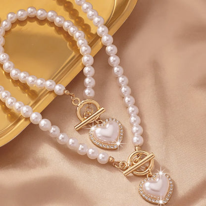 Set de 2 piezas de cuentas con corazón: pulsera y collar