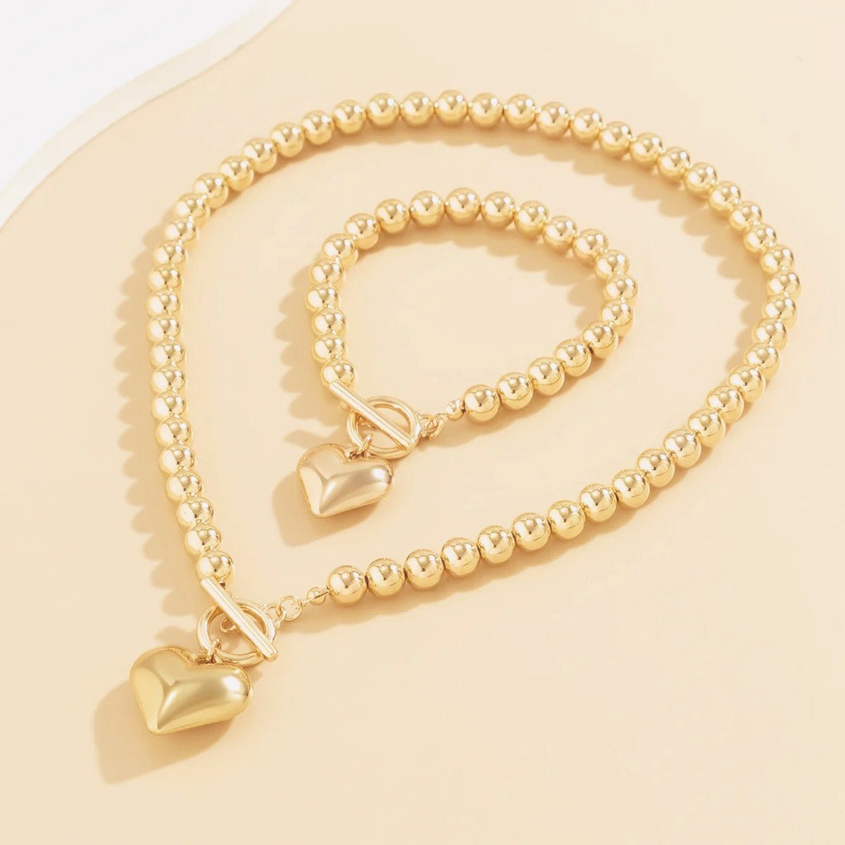 Set de 2 piezas de cuentas con corazón: pulsera y collar