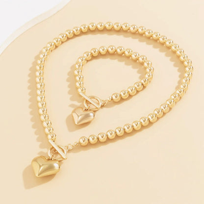 Set de 2 piezas de cuentas con corazón: pulsera y collar