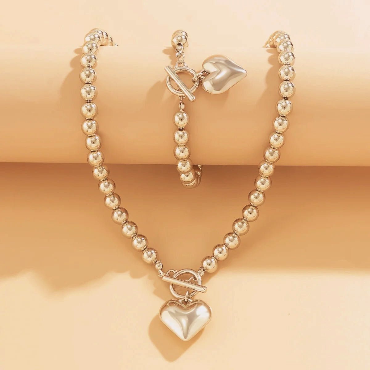 Set de 2 piezas de cuentas con corazón: pulsera y collar