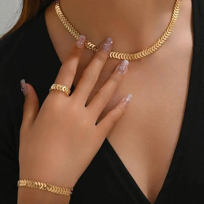 Set elegante de espiga: collar, pulsera y anillo