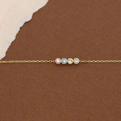 Pulsera delicada de cadena con piedra de nacimiento