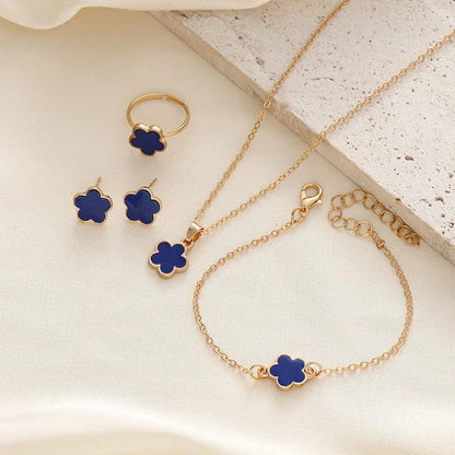 Set delicado de trébol floral de la suerte: collar, pulsera, aretes y anillos