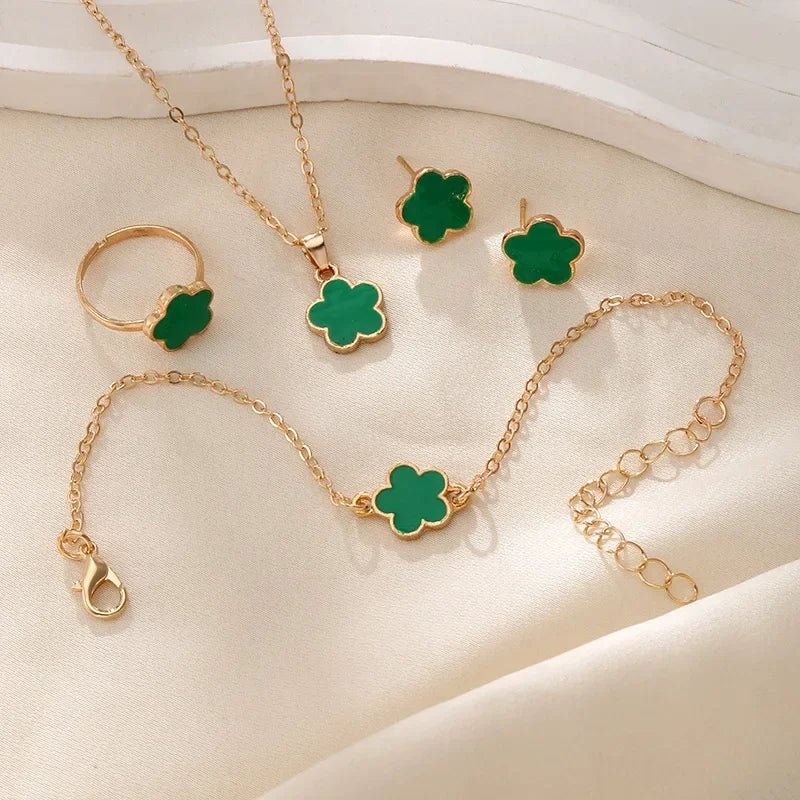 Set delicado de trébol floral de la suerte: collar, pulsera, aretes y anillos