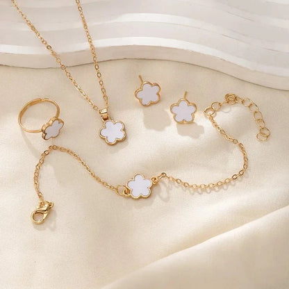 Set delicado de trébol floral de la suerte: collar, pulsera, aretes y anillos