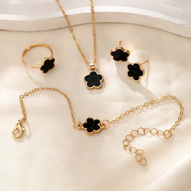Set delicado de trébol floral de la suerte: collar, pulsera, aretes y anillos