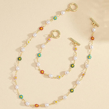 Set delicado Primavera Floral de perlas: pulsera y collar