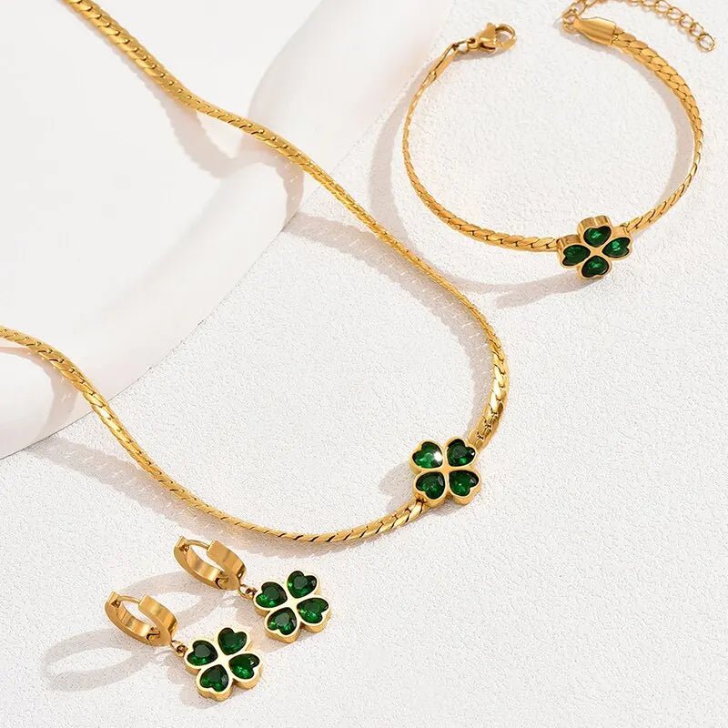 Set de trébol de cuatro hojas esmeralda: collar, pulsera y aretes