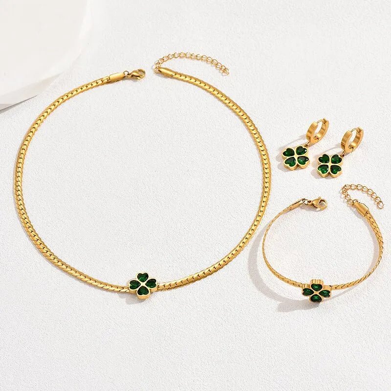 Set de trébol de cuatro hojas esmeralda: collar, pulsera y aretes