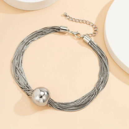 Set elegante de collar y pulsera multicadena con esferas